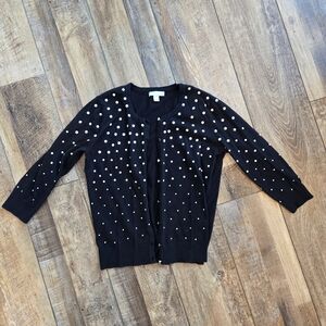 New York And Company Size Medium, Black Sweater with White Accents.